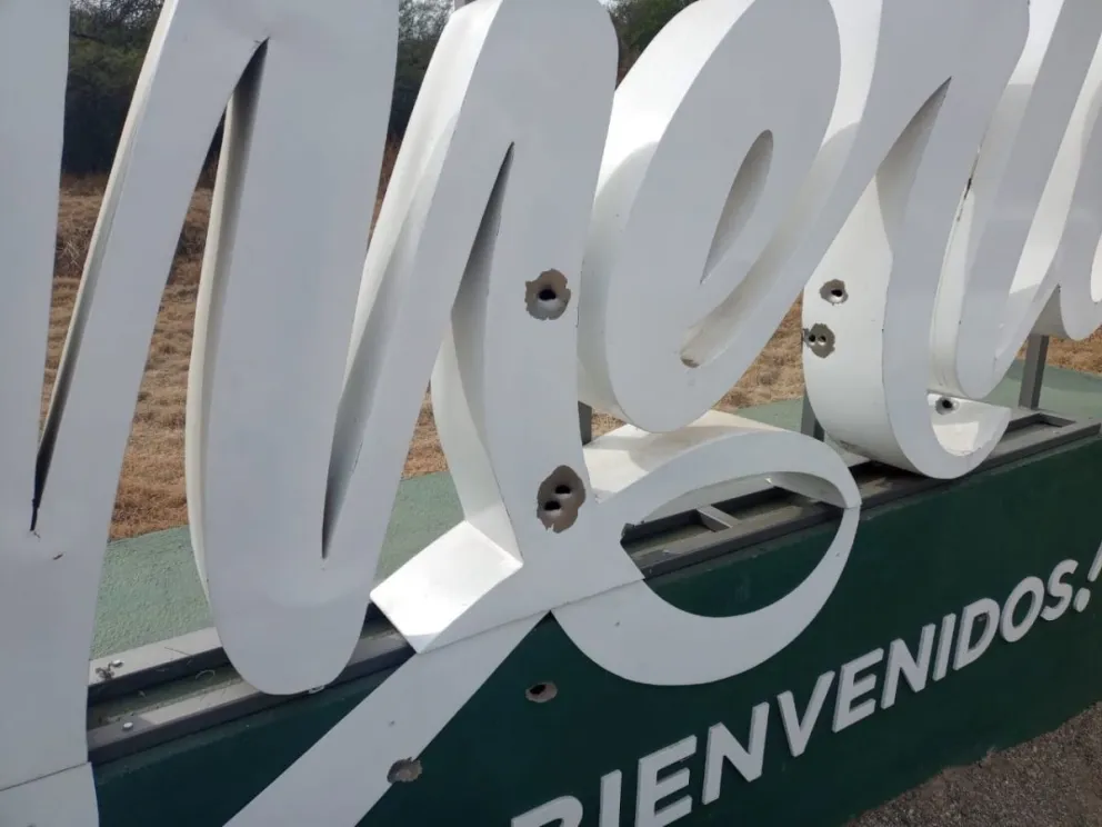 Otro cartel de Villa de Merlo usado para practicar el tiro al blanco